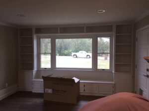 inside view of old room overlooking a white car