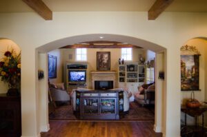 living room interior with fireplace and cabinetry