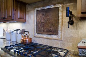 view of the kitchen stove with wall display