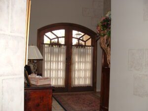 A doorway leading to a living room.