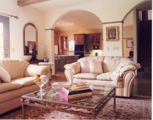 A tan couch in a living room.